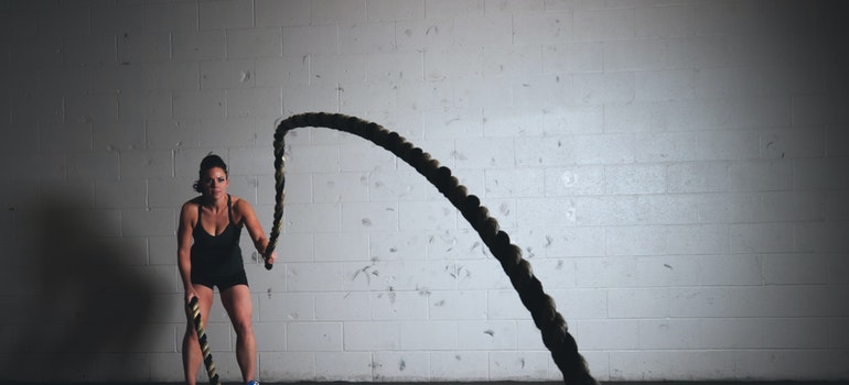 A woman doing crossfit.
