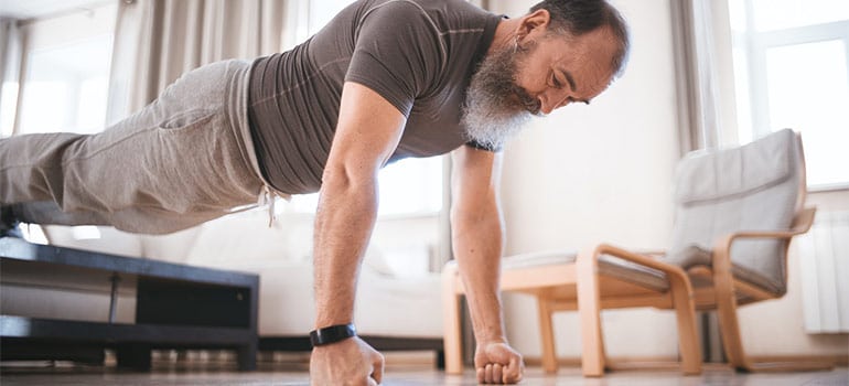 a man doing a decline push-up