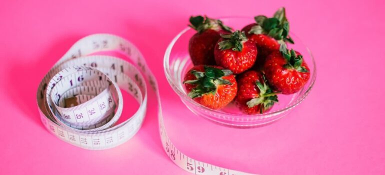 strawberries and measure tape