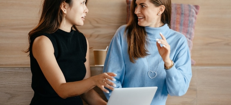 two personal trainers talking about ways to power your PT career in Dubai