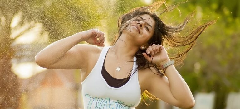 Happy woman doing Zumba