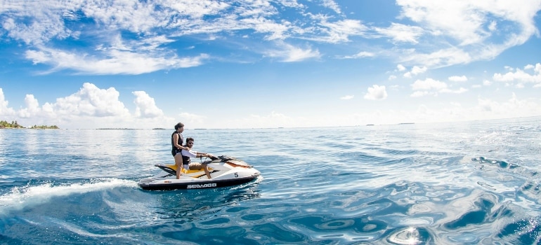 Two people jet skiing