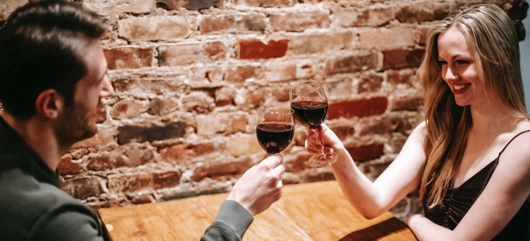 A couple drinking wine in a restaurant
