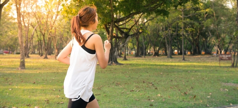 A woman jogging in a park