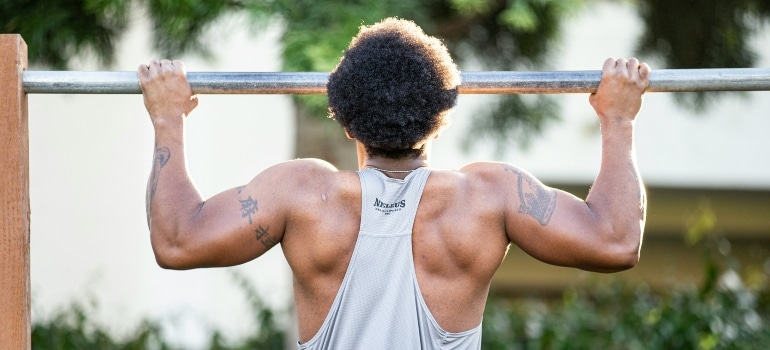 Picture of a person doing a pull up