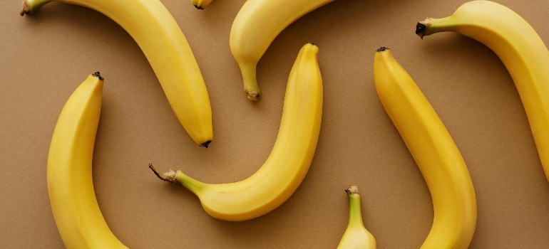 bananas on a brown surface
