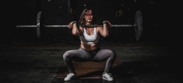 A woman lifting weights.