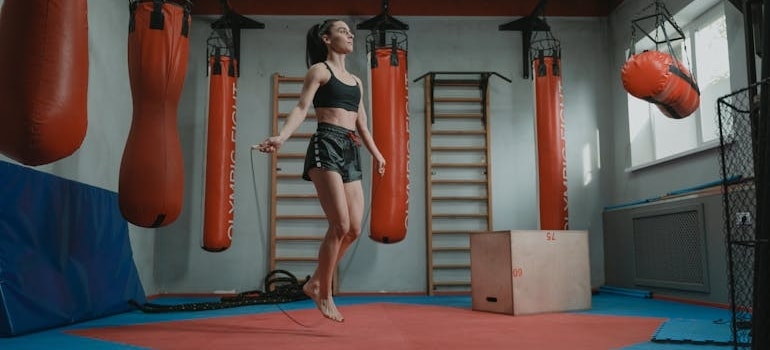 A girl using a jump rope as one of the options for indoor cardio workouts.