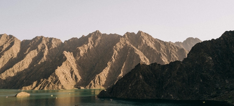View of Hatta lake and mountains in UAE.