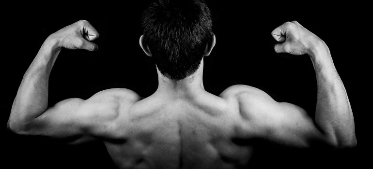 A man showing his back muscles