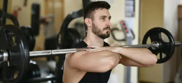 A man working out after learning the role of strength training in managing insulin resistance