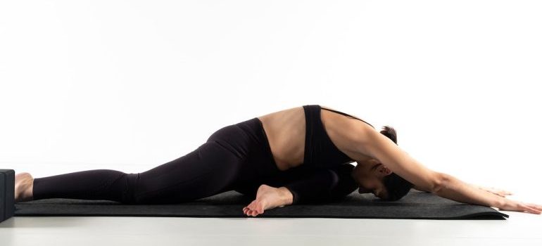 A woman stretching before the exercise