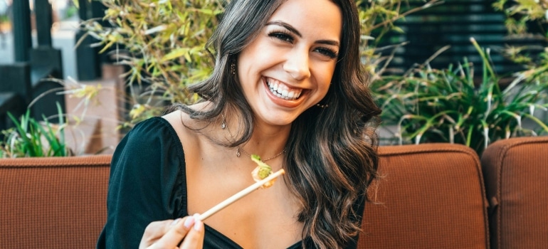 Person getting ready to eat and thinking about the top foods to eat before and after a workout