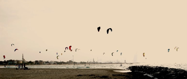 People enjoying Kite Beach and kitesurfing Dubai offers