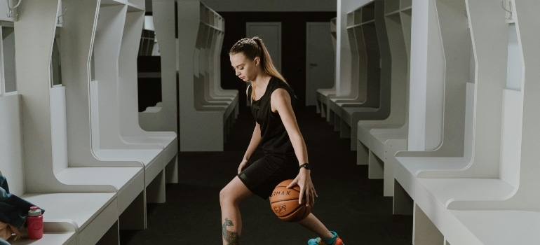 a girl playing basketball